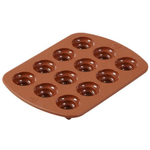 Load image into Gallery viewer, Wilton Ind Wilton RO Swirl Candy Silicone Mold 12 cavities,